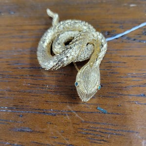 Vintage Gold Snake Brooch with Blue Eyes