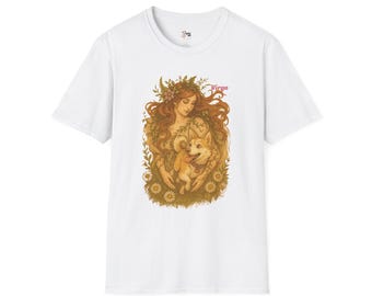 May include: White t-shirt featuring a detailed illustration of a woman with long red hair, holding a corgi dog. The design includes floral elements and the word "Virgo" in pink. The shirt is a classic crew neck.