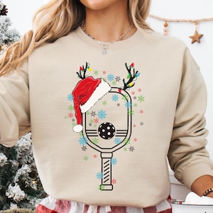 Santa Hat Christmas Design Pickleball Hoodie, Family Pickleball Player Xmas Gift Sweatshirt, Pickleball Racket With Reindeer Antlers Sweater