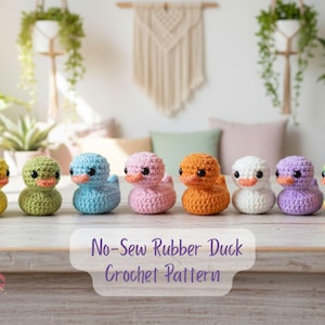 May include: A collection of eight colorful, crocheted rubber ducks. Each duck features a unique color scheme, including yellow, green, blue, pink, orange, white, purple, and rainbow stripes. The ducks have orange beaks and are arranged on a wooden surface.