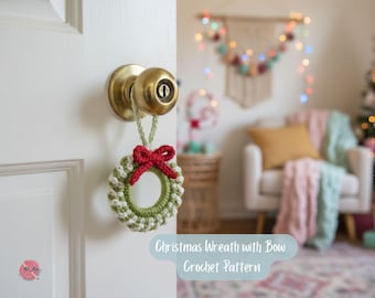 May include: A handmade crochet Christmas wreath with a red bow, hanging from a gold doorknob. The wreath features green and white yarn, creating a festive holiday decoration. Text on the image reads "Christmas Wreath with Bow Crochet Pattern."