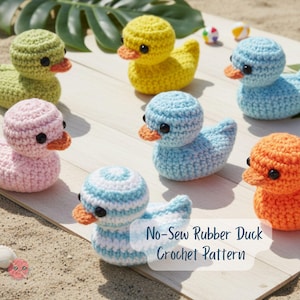 May include: A collection of colorful, crocheted rubber duck toys in various shades of green, yellow, pink, blue, and orange. Each duck has black eyes and an orange beak. The text "No-Sew Rubber Duck Crochet Pattern" is visible.