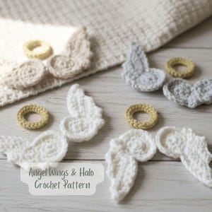 May include: A selection of crocheted angel wings and halos in white, grey, and beige. The image displays multiple sets of wings and halos, with the text "Angel Wings & Halo Crochet Pattern" visible at the bottom.