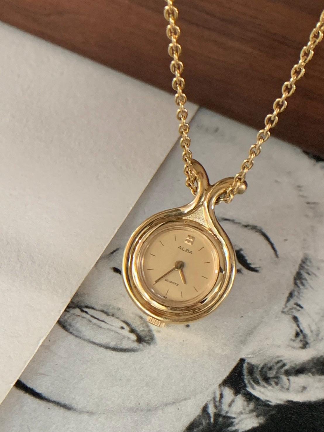 Vintage ALBA SEIKO Gold Tone Metal Pendant Watch With Chain  display picture 2