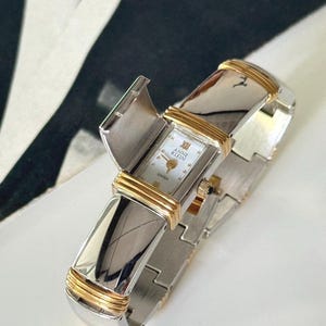 ANNE KLEIN  Swiss vintage Gold & SilverTone, Bracelet Swiss Watch, Swiss Made, With Gold Leaf  ,Peek A Boo watch