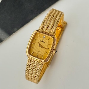 Vintage CYMA  Gold tone swiss made , quartz watch , Ladie watch