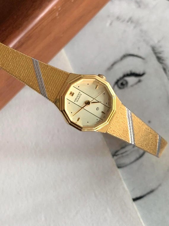 Vintage ORIENT Gold and Silver Tone Japan Made Quartz Watch