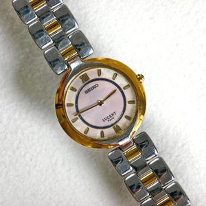 Reloj Seiko Lucent Paris unisex de cuarzo, raro, para mujer, con brazalete bicolor de 30,2 mm.