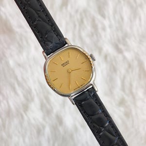 Vintage Seiko Women's Quartz Watch, Silver Cushion Case, Gold Accents, Black Leather Strap