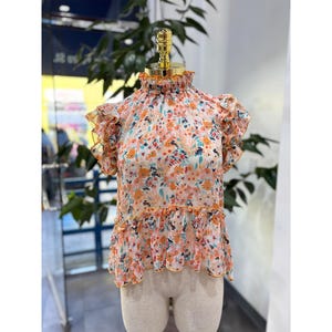Orange Peplum Blouse with Ruffled Neckline