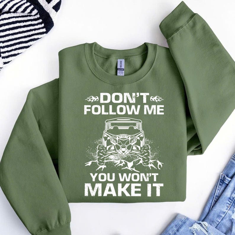 a green shirt that says don't follow me you won't make it
