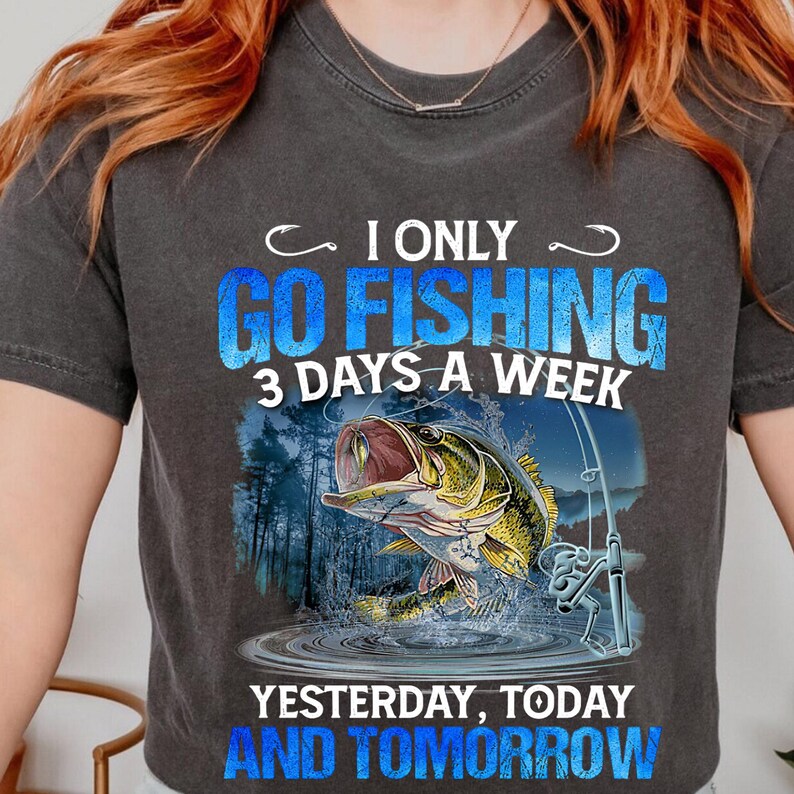 a woman wearing a t - shirt that says i only go fishing 3 days a