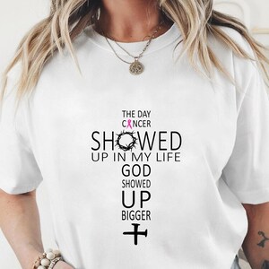 a woman wearing a white t - shirt with the words showed up in my