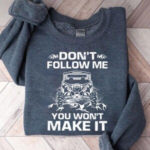 a sweatshirt that says, don't follow me you won't make it