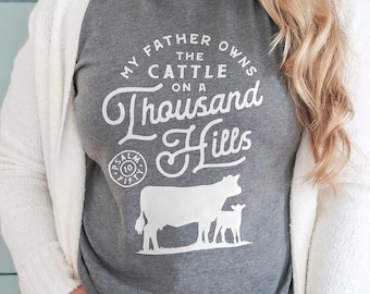A Thousand Hills Women's Christian Shirt | Womens Christian Shirts,  Christian Cow Shirt, Cute Christian Shirts, Christian Farmhouse Shirt
