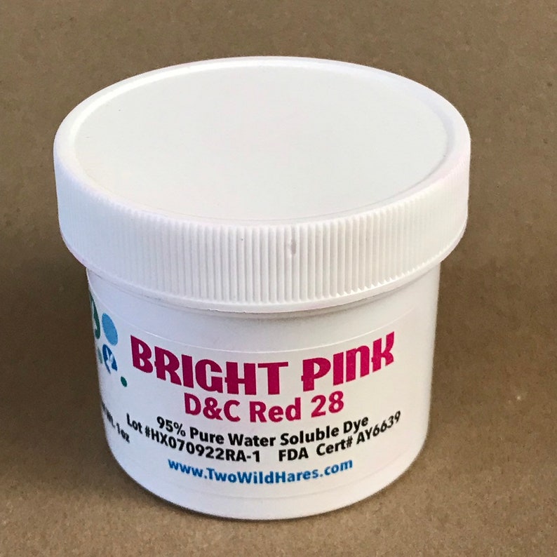 May include: A white plastic jar with a pink label that reads "BRIGHT PINK D&C Red 28 95% Pure Water Soluble Dye Lot #HX070922RA-1 FDA Cert# AY6639 www.TwoWildHares.com"