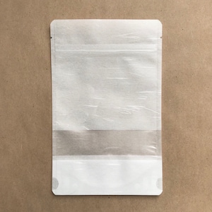100-5x8" PAPEL DE ARROZ branco Eco Friendly Stand Up Bolsas, entalhe de rasgo, vedação com zíper, selável por impulso, embalagem, duas lebres selvagens