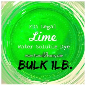 May include: A jar of bright green, FDA legal lime water soluble dye. The jar is labeled "FDA Legal Lime Water Soluble Dye" and "Bulk 1 LB."