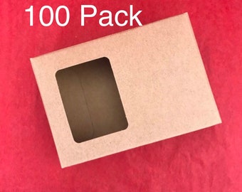 May include: A pack of 100 brown cardboard boxes with a window cut out. The boxes are designed for packaging small items.
