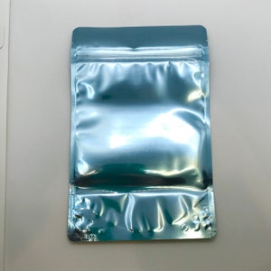 25-5x8&quot; ARCTIC/Clear Foil Stand Up Pouches, Heavy Duty, Tear Notch, Zipper Seal, Impulse Sealable