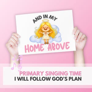 May include: A white sign held by hands, featuring a cartoon angel with blonde hair, a halo, and a white dress, standing on a cloud. The sign reads "AND IN MY HOME ABOVE" and "PRIMARY SINGING TIME I WILL FOLLOW GOD'S PLAN".