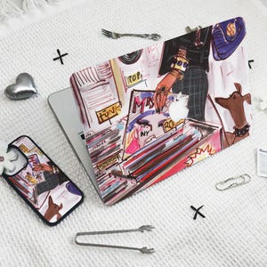 May include: A colorful laptop skin with a hand holding a record, a dog, and the words "Mrs. Funk" and "NY" on it.