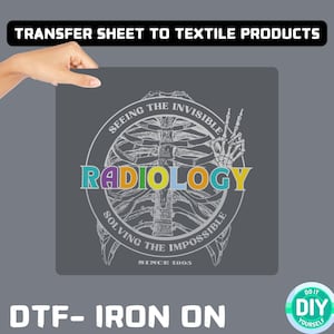May include: A dark gray DTF iron-on transfer sheet featuring a white skeletal rib cage illustration. The text reads RADIOLOGY in multicolored letters, surrounded by the phrases SEEING THE INVISIBLE, SOLVING THE IMPOSSIBLE, and SINCE 1895.
