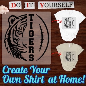 May include: A DIY heat transfer design featuring a tiger head and the word "TIGERS" on a football shape. The image includes two t-shirts, one white and one beige, with the design applied. Text reads "Do It Yourself" and "Create Your Own Shirt at Home!"