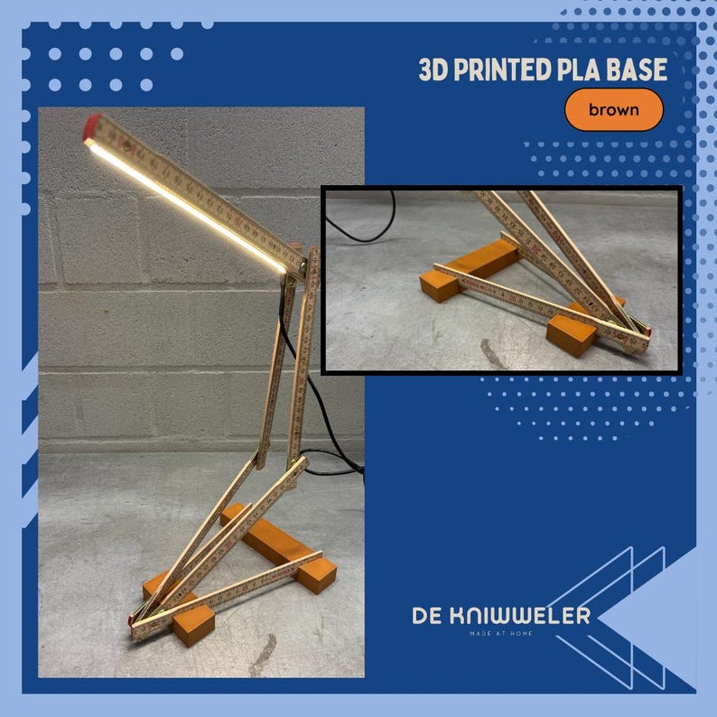 May include: A unique desk lamp with a 3D printed brown PLA base. The lamp is constructed from wooden folding rulers and features a bright LED light. The design includes the text "3D PRINTED PLA BASE" and "brown".