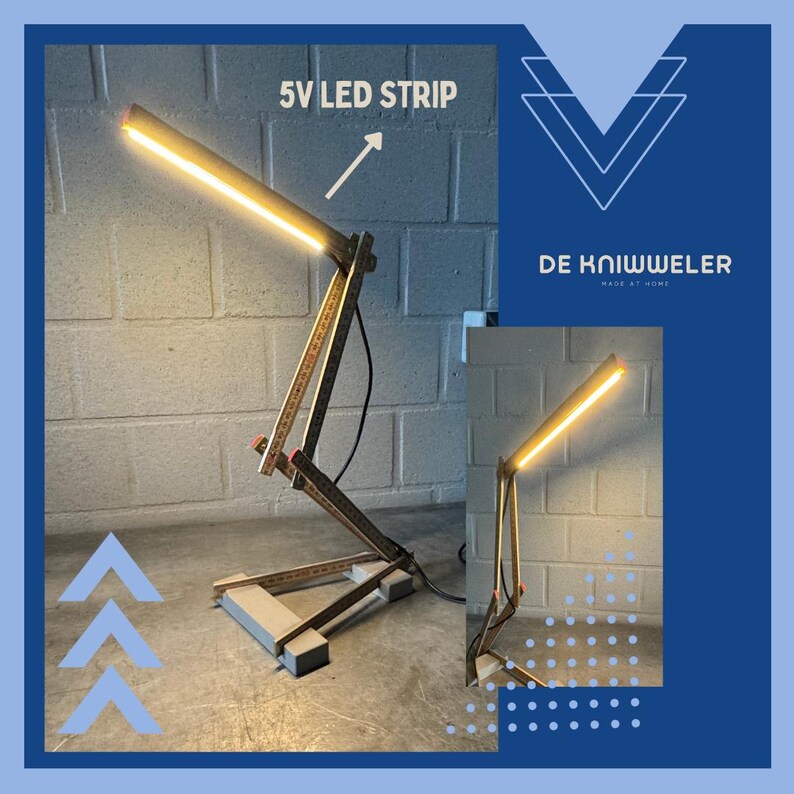 May include: A handmade desk lamp with a warm LED light strip. The lamp is constructed from wood and measuring sticks, with the text "5V LED STRIP" and the logo "DE KNIWWELER MADE AT HOME" visible.