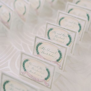luxury calligraphy wedding escort cards with watercolor painting