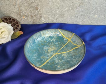 Handmade Kintsugi Bowl: Blue Ceramic Wabi Sabi Art with Gold Repair