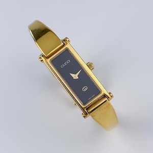 Gucci vintage horloge gouden 1500 l zwarte wijzerplaat