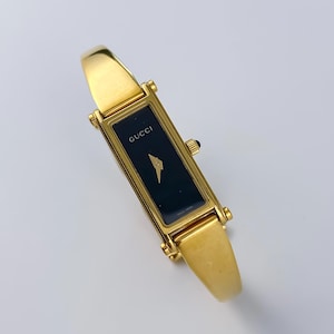 Gucci vintage gouden horloge zwarte wijzerplaat