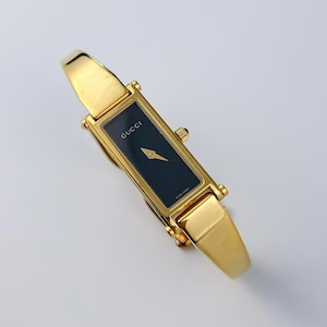 Gucci vintage horloge gouden 1500 l zwarte wijzerplaat