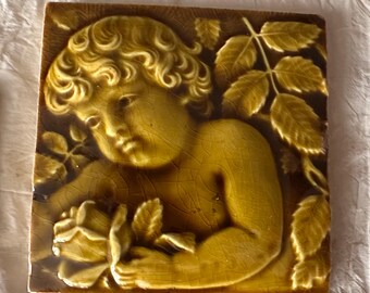 Trent Tile Cherub & Roses Fireplace Tile Set — Amber Majolica, Trenton NJ, c. 1885–1895