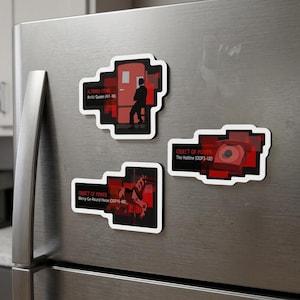 May include: Three rectangular magnets with white borders featuring red and black graphic designs. One shows a silhouette of a person, labeled Altered Items Arctic Queen. Another shows a red rotary phone, labeled Object of Power The Hotline.