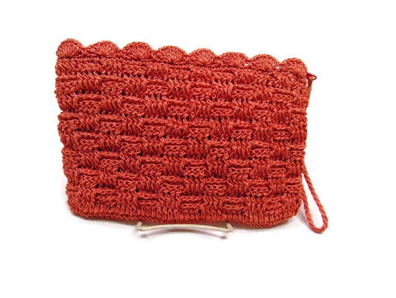 coral pink clutch bag