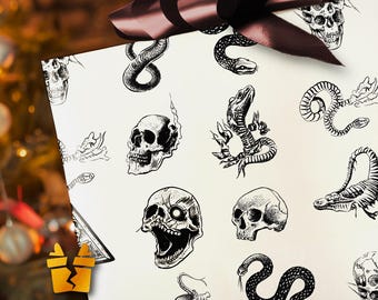 May include: White gift wrap featuring black illustrations of skulls and snakes. A dark brown bow is on top of the wrapped gift. The wrapping paper has a repeating pattern of detailed drawings.