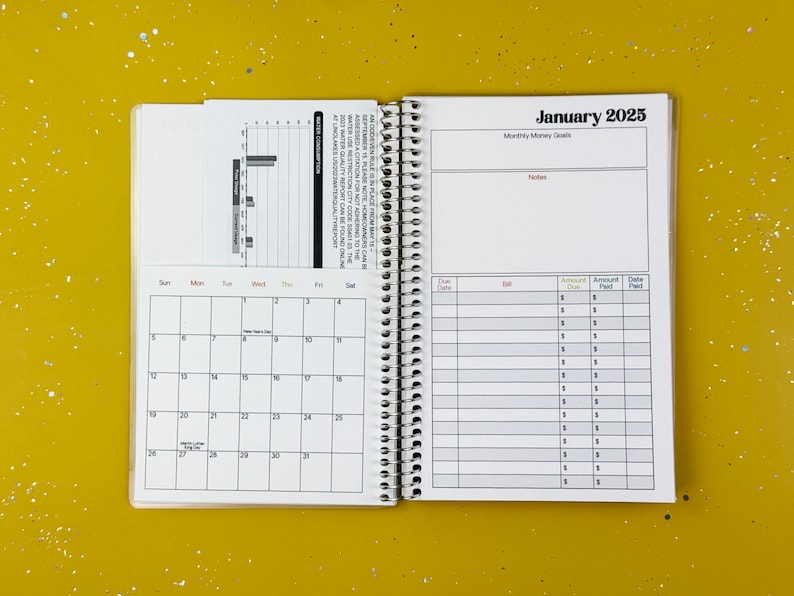 a calendar is open on a yellow surface