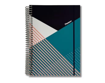 May include: A spiral-bound planner featuring a geometric cover design with black, teal, and white triangular sections. The cover includes diagonal pink stripes and white polka dots, with the word Planner printed in white on the black section.