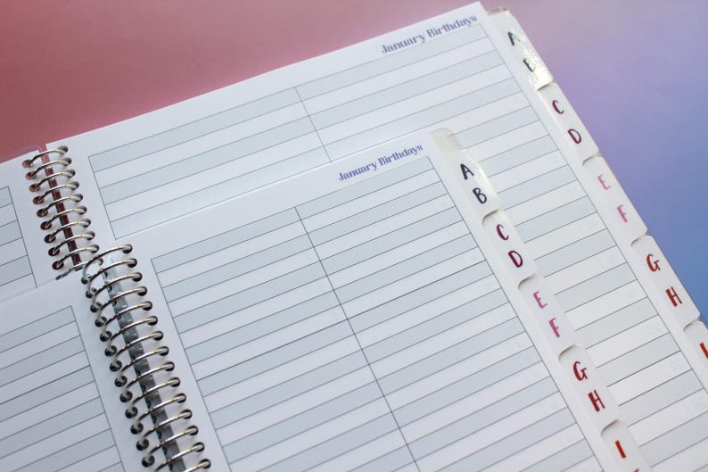 a spiral-bound notebook with a page dedicated to January birthdays, with a separate page for January birthdays and a separate page for January birthdays. The notebook is open and appears to be in use, with the page for January birthdays visible.