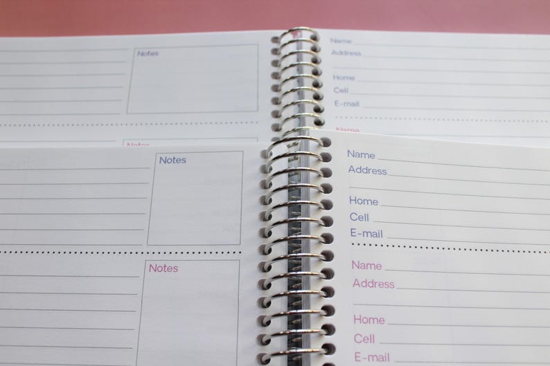 an open spiral-bound notebook with two pages visible, one of which has a blank space for notes and the other for contact information.