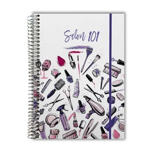 May include: A spiral-bound notebook with a white cover featuring the text Salon 101 in purple script. The cover is decorated with a scattered pattern of colorful beauty and hair salon tools, including scissors, a hair dryer, brushes, and makeup.