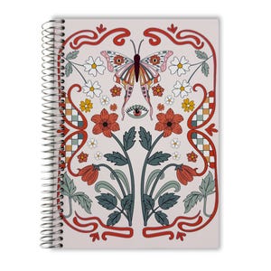 May include: Spiral-bound notebook with a cream-colored cover featuring a colorful butterfly, flowers, and an eye design. The design includes red, orange, green, and white elements, creating a vintage aesthetic.