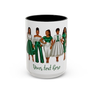 May include: White ceramic mug with a black interior rim. The mug features a design of five illustrated women in various green and white outfits. The text "Your text here" is written in green script at the bottom of the mug.