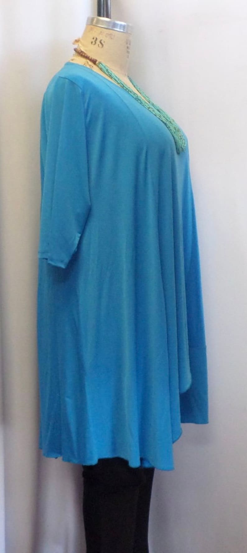 Plus Size Top Asymmetric Top Bust 50 inches Turquoise Blue Traveler Knit Size 1 Coco and Juan Plus Size Tunic fits 1X,2X Lagenlook