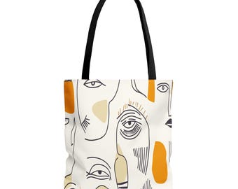 Bolso de mano con caras abstractas: un accesorio elegante para los amantes del arte