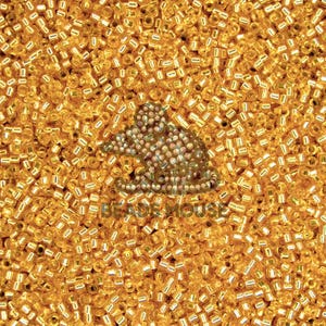 May include: A set of three ceramic nesting bowls in shades of blue, green, and white. The bowls feature a speckled glaze and a simple, modern design. The largest bowl is approximately 6 inches in diameter.