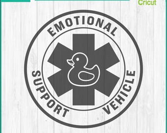 May include: A black and white graphic design featuring a duck inside a star of life symbol, with the words "EMOTIONAL SUPPORT VEHICLE" around the edge. The design includes the text "EASY CUT", "LAYERED BY COLOR", and "SVG, PNG, & DXF".